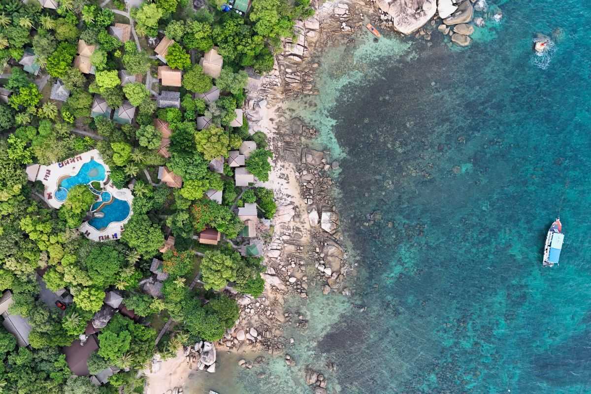 Aerial view of Mae Haad Beach and Sensi Paradise Beach Resort, Koh Tao