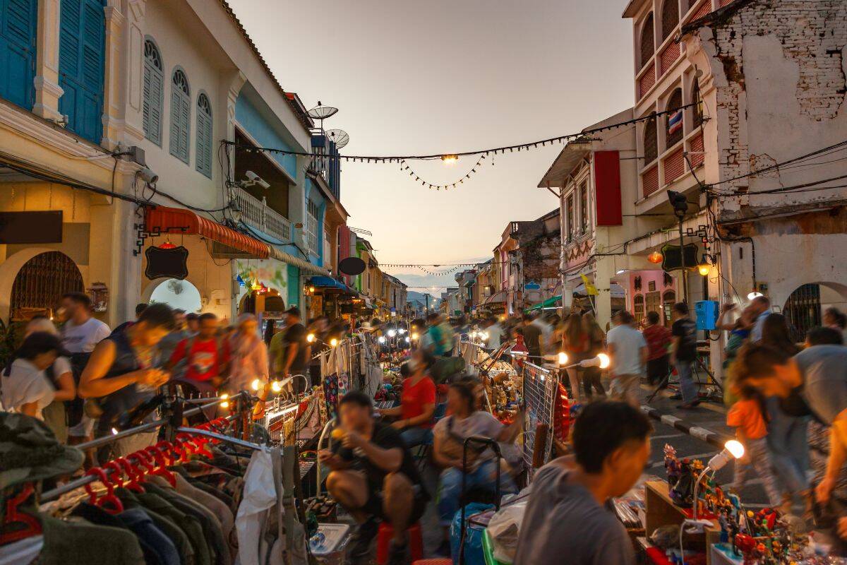 Phuket Town Night Market Lard Yai Thalang Road at sunset with illuminated shophouses