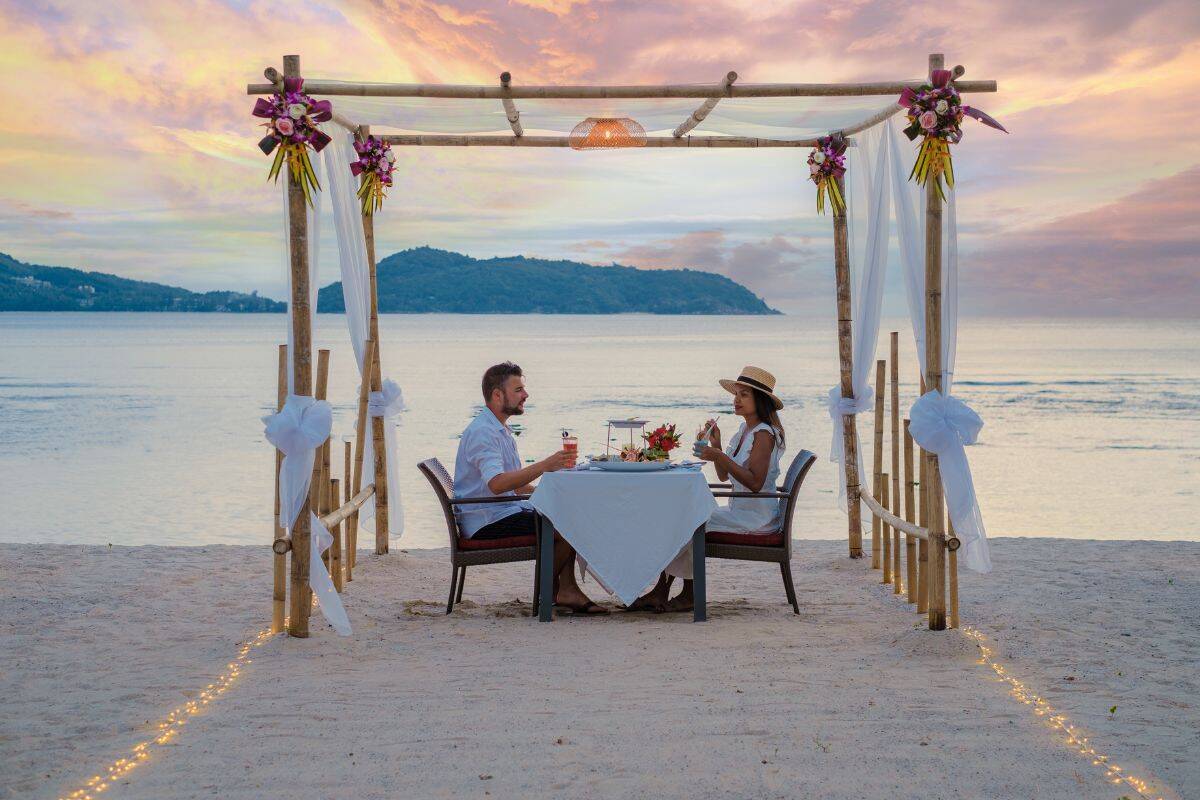 romantic dining in Phuket at sunset over the Andaman Sea